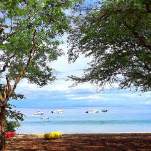 Beach in Costa Rica dotted with fishing boats